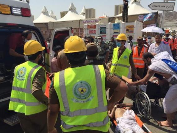 HAJJ STAMPEDE 2 - THEWILL NEWS MEDIA Members of Saudi civil defense try to rescue pilgrims following a crush caused by large numbers of people pushing at Mina, outside the Muslim holy city of Mecca in this handout picture published on Twitter account of the Directorate of the Saudi Civil Defense