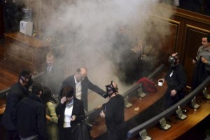 Opposition politicians release tear gas in parliament to obstruct a session in Pristina, Kosovo February 19, 2016. REUTERS/Agron Beqiri
