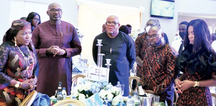 R-L Chiamaka Ndu-Melekwe & husband, Ndubuisi, Dr. Kingsley Emu (4th right) and guests.