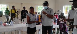 Bayo Ikujenyo Table Tennis Championship - THEWILL NEWS MEDIA Female champion, Mustapha Boluwatife, with her trophy