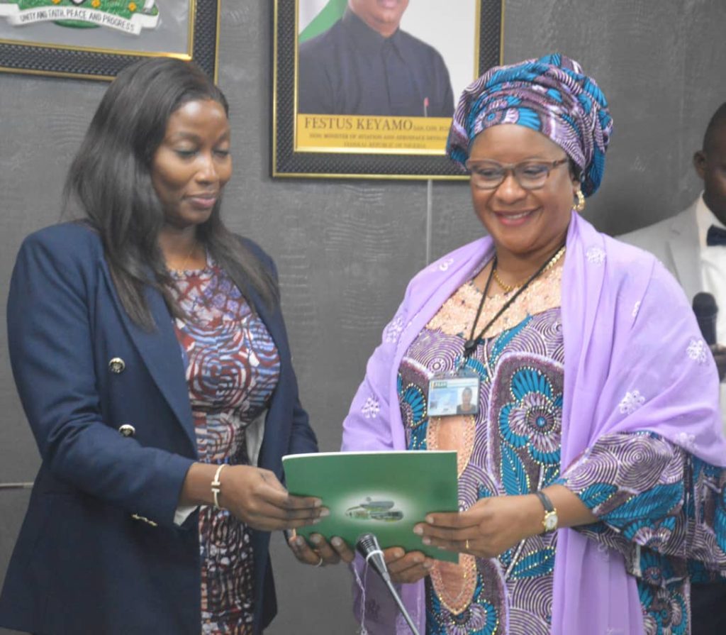 Mrs Olubunmi Oluwaseun Kuku, MD/CEO, FAAN receiving a handing over note from Mrs Bridget Golf, Company Secretary/Legal Adviser of FAAN on behalf of Mr Kabir Muhammed, former MD/CEO, during the maiden meeting with top management staff of FAAN in Lagos on Monday