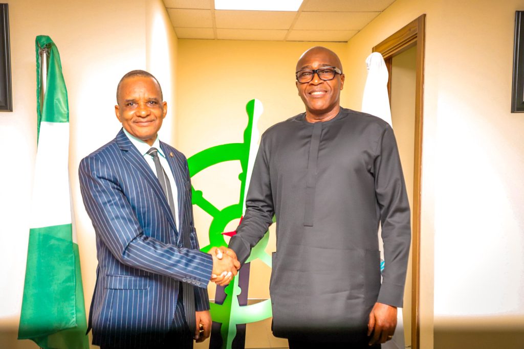 Outgoing Director General, Nigerian Maritime Administration and Safety Agency, NIMASA, Dr Bashir Jamoh, OFR (right) in a warm handshake with Executive Director, Finance and Administration/Acting Director General, Hon. Chudi Offodile during the Hand-Over Ceremony held at the NIMASA Towers in Victoria Island, Lagos.
