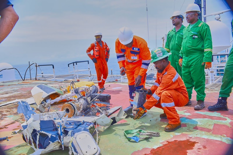 Aircraft Accident Investigators at work. - THEWILL NEWS MEDIA helicopter crash search
