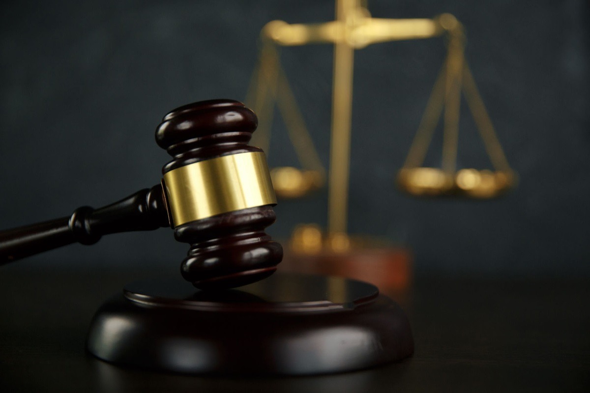 Judge gavel, scales of justice and law books in court - THEWILL NEWS MEDIA