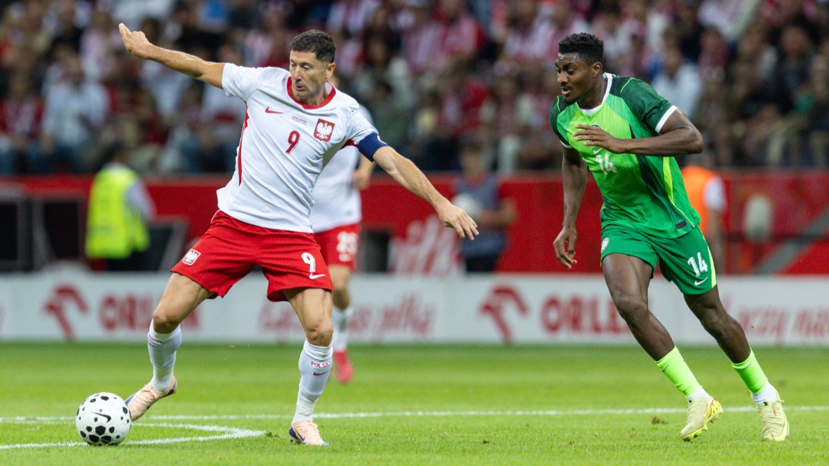 Robert Lewandowski, Rafiu Durosinmi - THEWILL NEWS MEDIA Robert Lewandowski, Rafiu Durosinmi