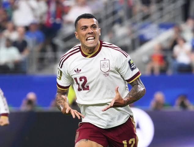 Pedro Porro celebrates after doubling Spain's advantage with a brilliant second-half finish in the World Cup semifinal. - THEWILL NEWS MEDIA Spain national team footballer wearing number 12 celebrates a goal during a match on the field.