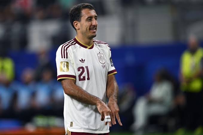Mikel Oyarzabal celebrates after calmly converting the penalty that gave Spain the lead against France in Dallas. - THEWILL NEWS MEDIA Male soccer player in a white jersey with maroon trim and number 21 on the field during a match.