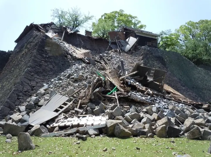 Severe earthquake damage is seen at the historic Kumamoto Castle in southwestern Japan after a powerful quake triggered structural collapses, underscoring the destructive impact of the seismic event on one of the country's most treasured cultural landmarks. Photo credit: Getty Images. - THEWILL NEWS MEDIA