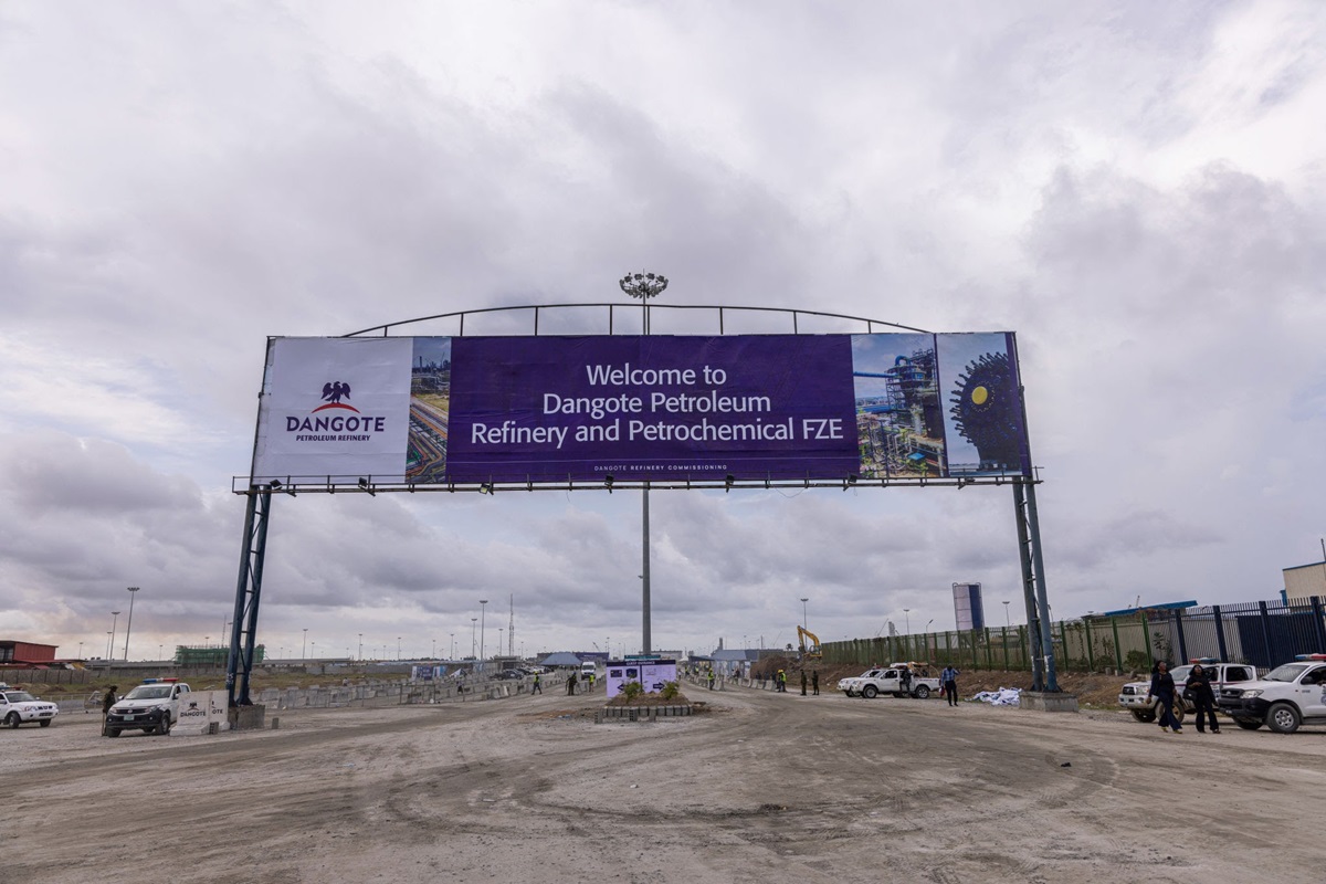 Dangote Petroleum Refinery and Petrochemical complex - THEWILL NEWS MEDIA Billboard welcoming visitors to Dangote Petroleum Refinery and Petrochemical FZE at an industrial site