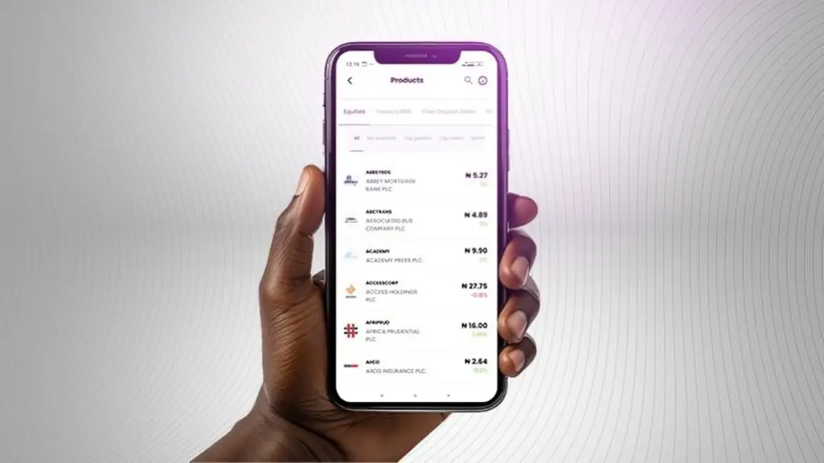 Stock-trading App - THEWILL NEWS MEDIA Hand holding a purple-cased smartphone displaying a shopping app with a list of products and prices on a white background.