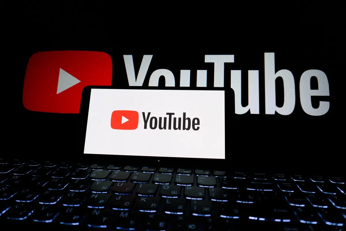 YouTube’s logo displayed on a laptop screen - THEWILL NEWS MEDIA Website