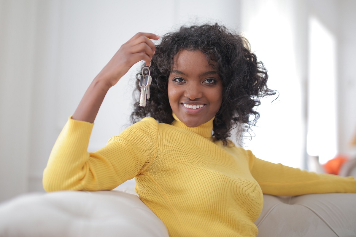 A woman holds house keys - THEWILL NEWS MEDIA Pension