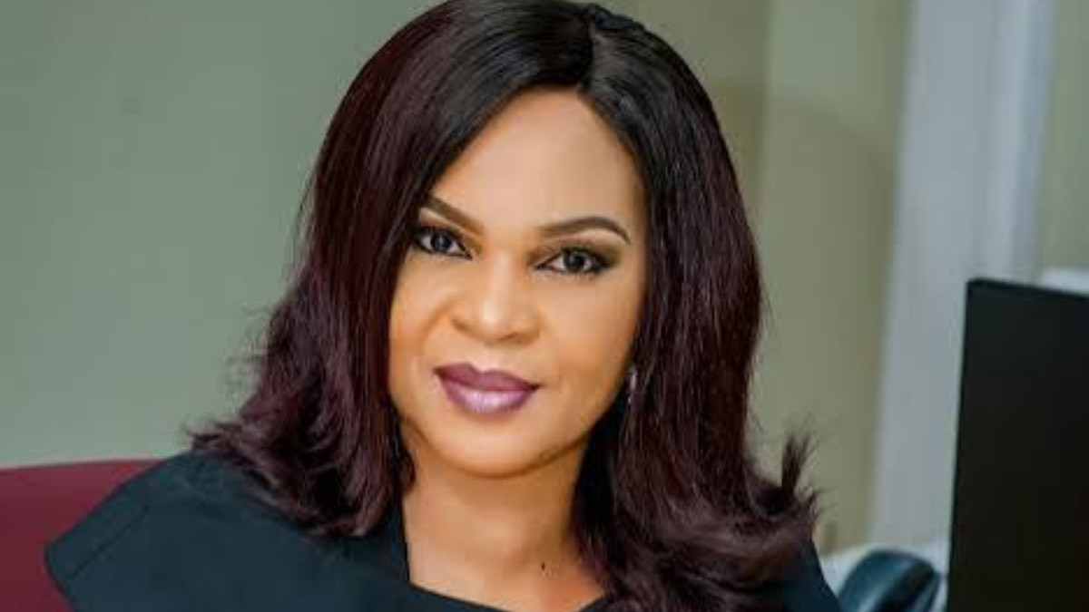 Lynda Saint-Nwafor - THEWILL NEWS MEDIA Professional woman with dark shoulder-length hair and makeup, seated in an office setting with a neutral background and soft smile.